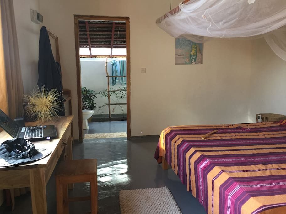 view from bedroom to bathroom
