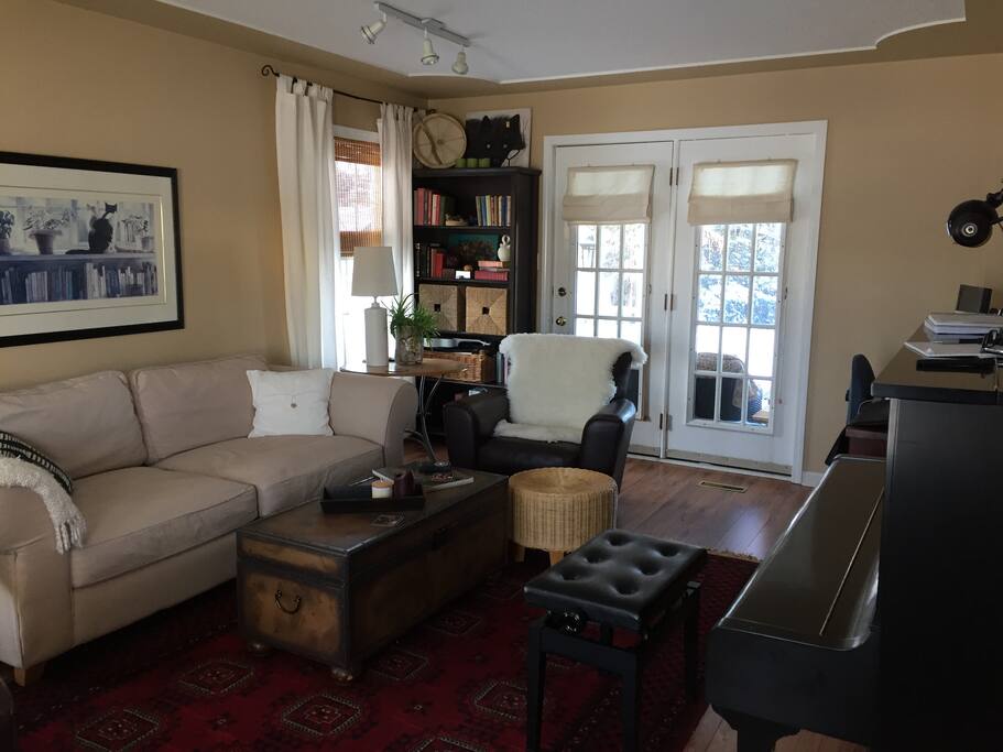 Warm and inviting living room for reading, relaxing listening to... or playing music.