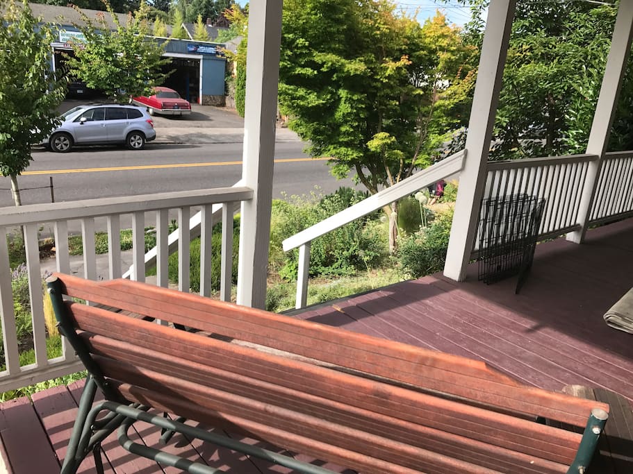 Lovely porch glide perfect for wine and people watching
