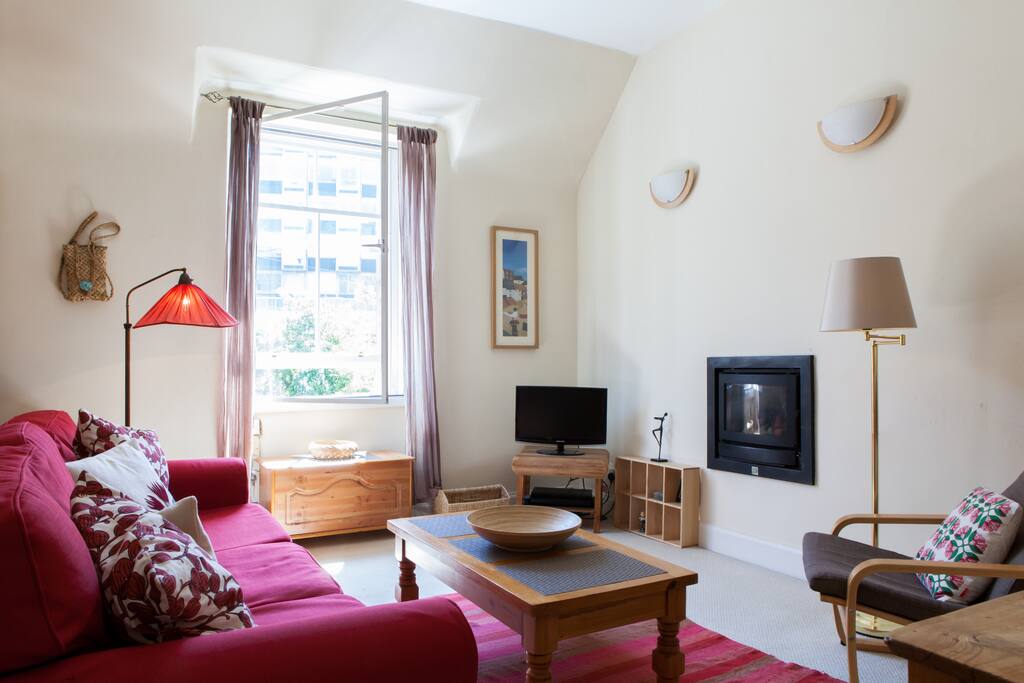 Comfortable sitting room, airy by day and cosy by night