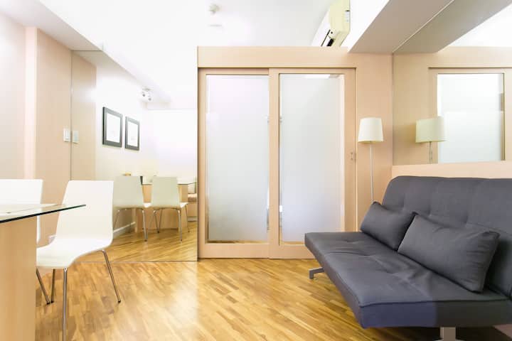 Living and Dining. Couch opens to a bed