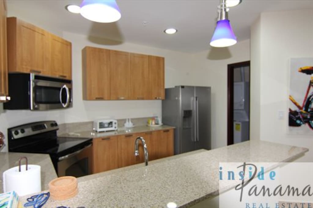 Off to the right is your laundry room with washer/dryer facilities.