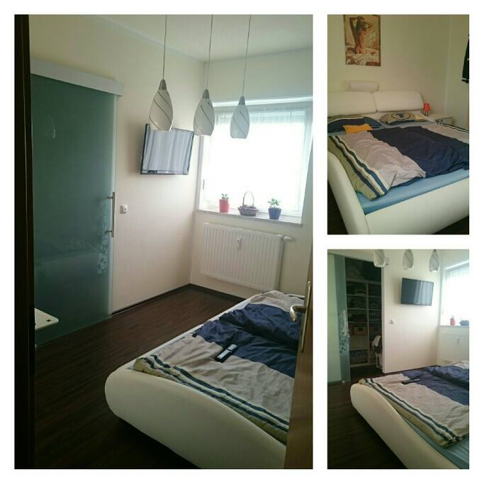 Schlafzimmer mit begehbaren Kleiderschrank