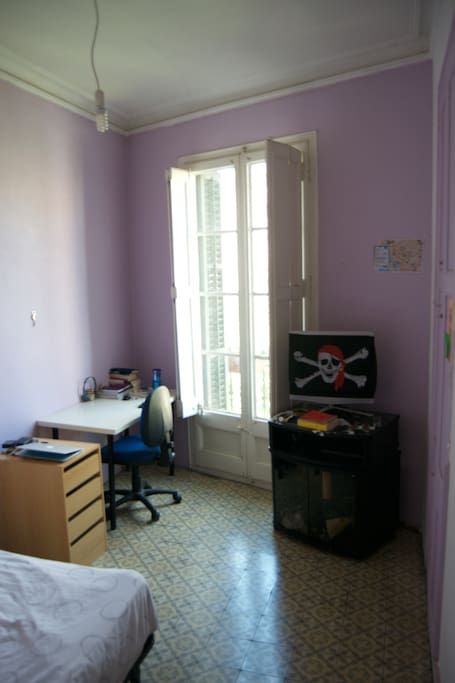 Room with private desk and balcony. Pirate friendly.