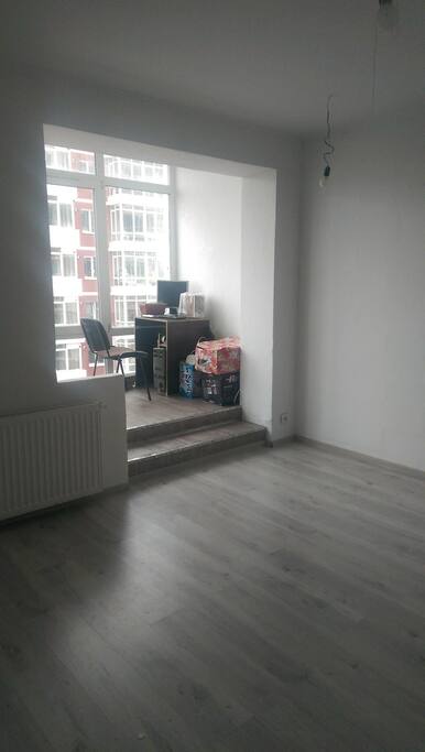 We have a beautiful loggia on which there is a folding armchair and there is a workplace