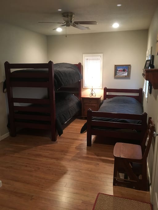 One of two cozy country bunkrooms for 3. Each with a sink, shower and commode.