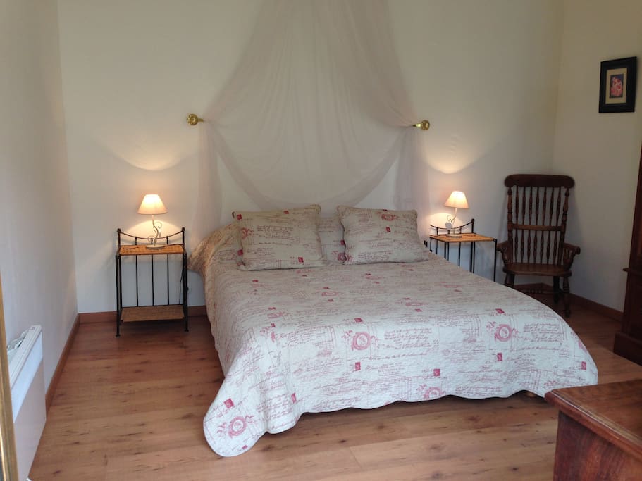 Master bedroom with kingsize bed
