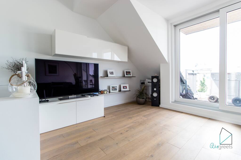The modern TV promises movie nights with cinema flair.