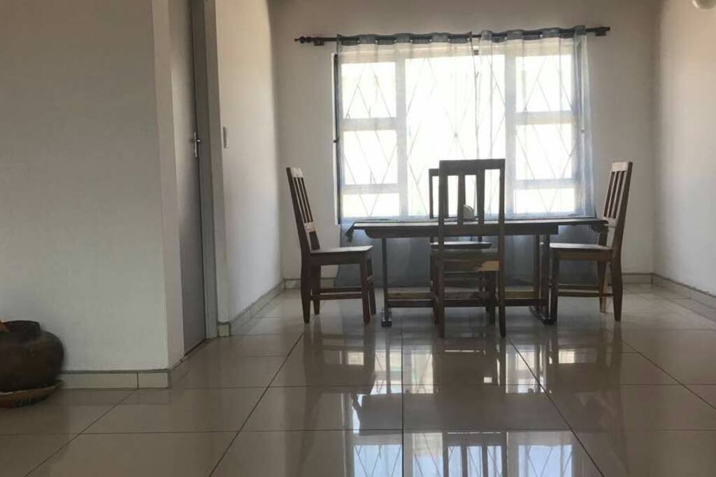 1970s dinning room set with traditional Oshikwanyama decor