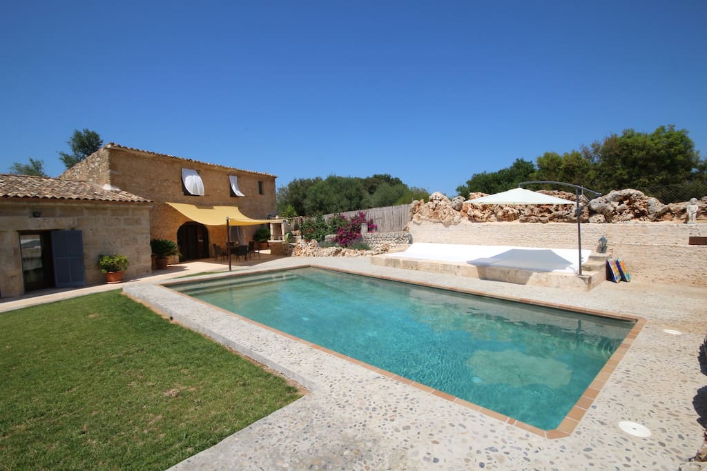 Large garden with pool.