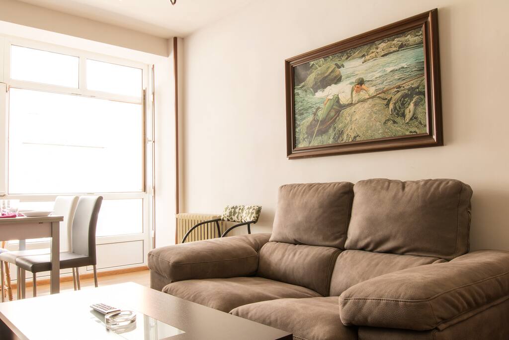 We kept some of the old paintings. The sofa is super comfy, but isn't a bed.