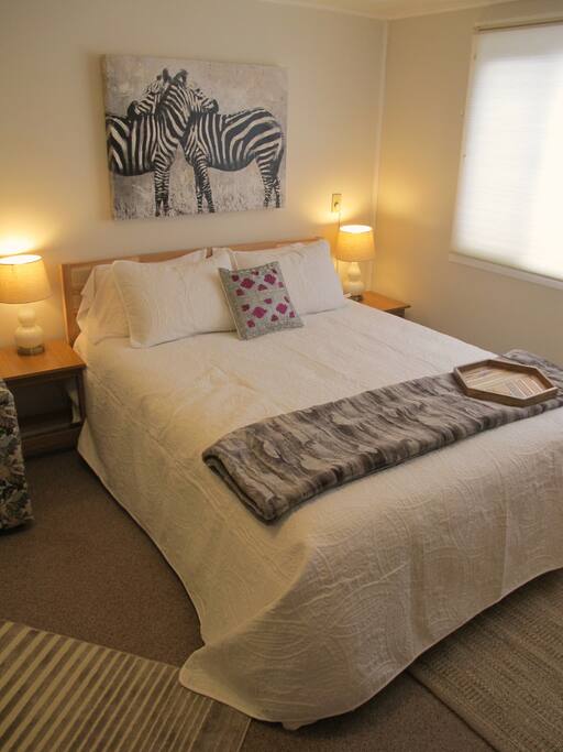 Super comfy queen size memory foam mattress, standard and memory foam pillows, super soft sheets, and cozy blankets.