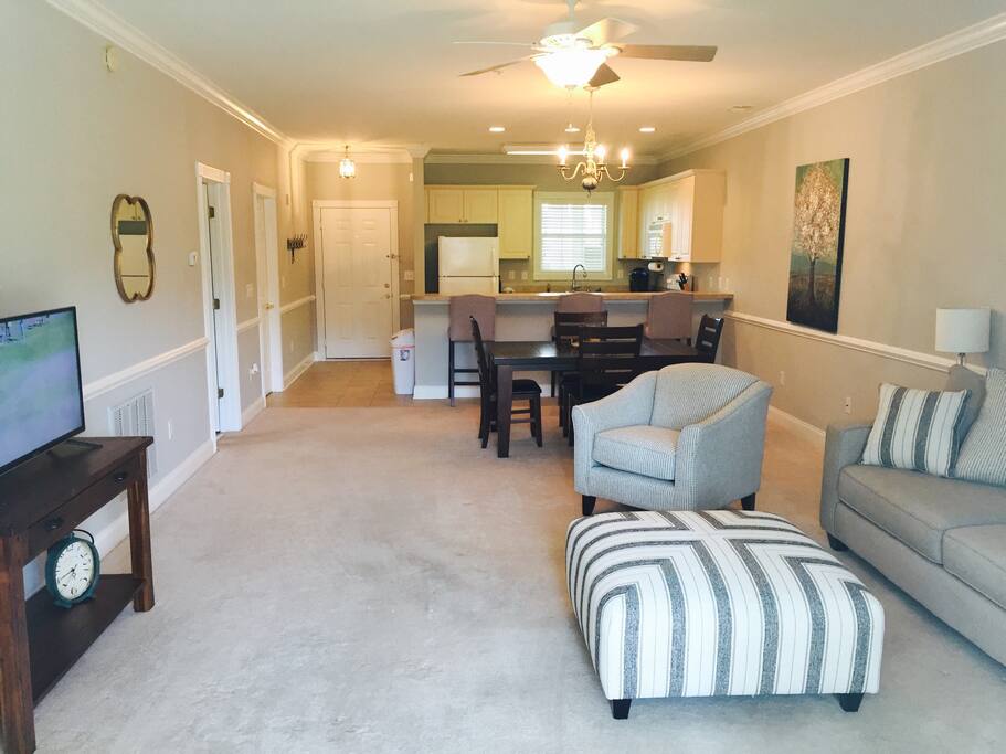 Beautiful great room with all new furnishings over looking the golf course
