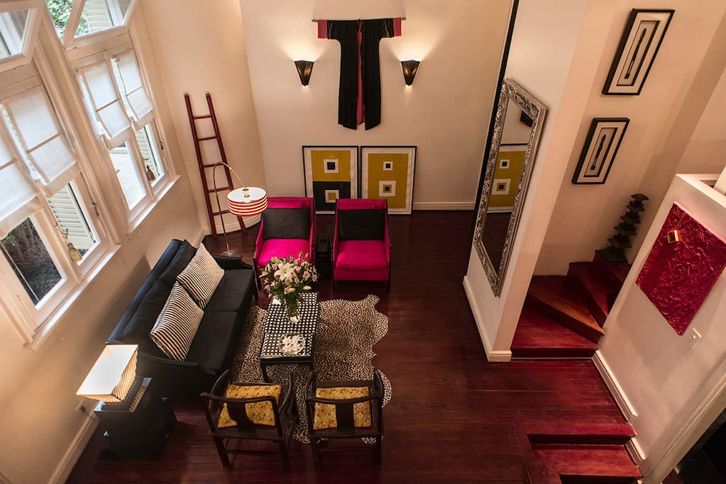 LIVING ROOM WITH 15' CEILINGS AND GARDEN VIEW