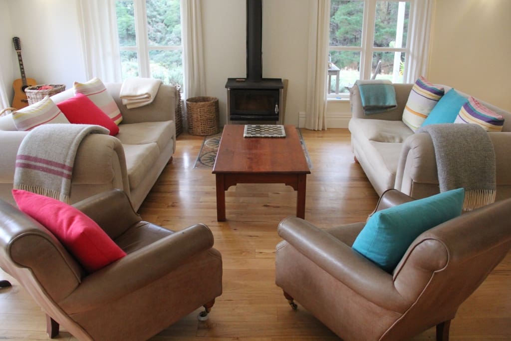 Sofa's and chairs by the wood burner
