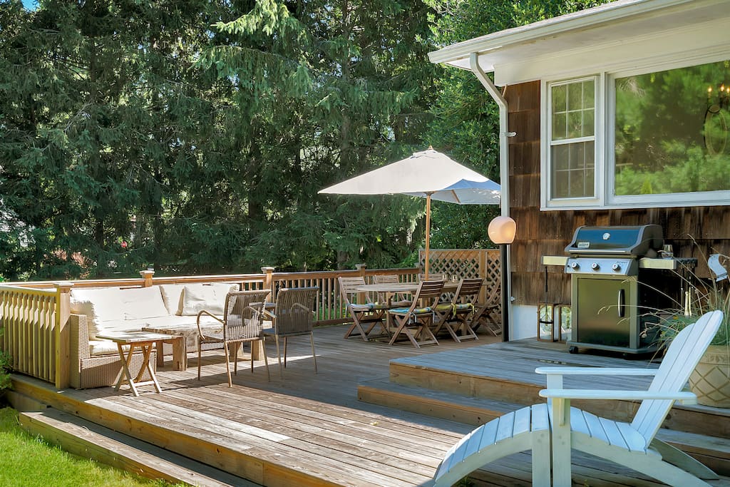 A lovely deck with dinning and lounge area and weber BBQ