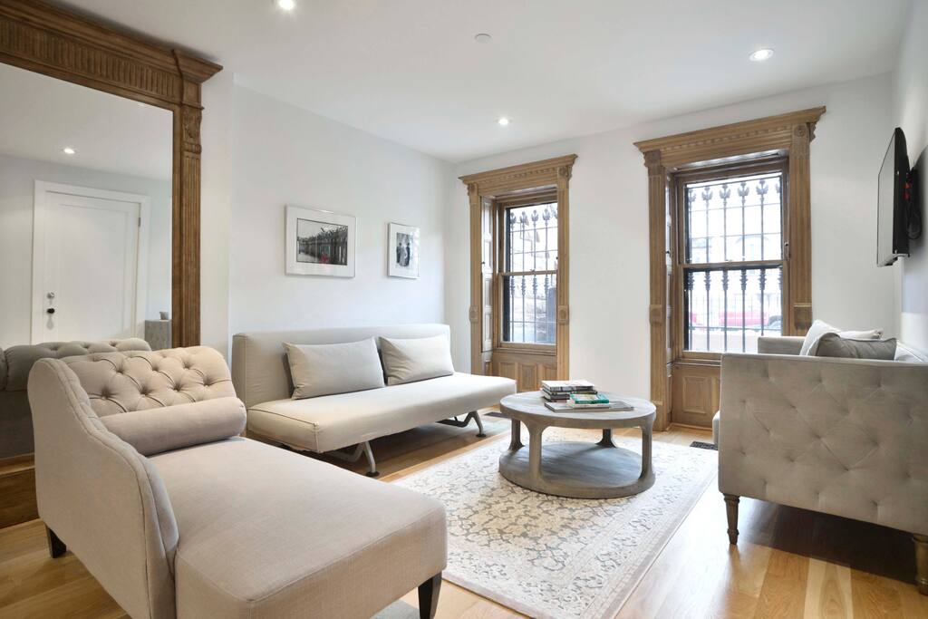 Living room with flat-screen TV and fold-out Queen sofa