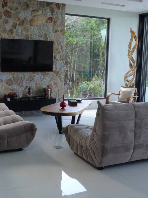 Living room with large TV screen
