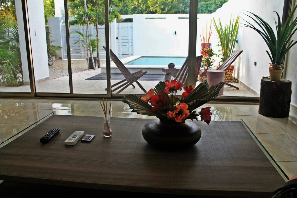 Open plan house with lovely pool view.