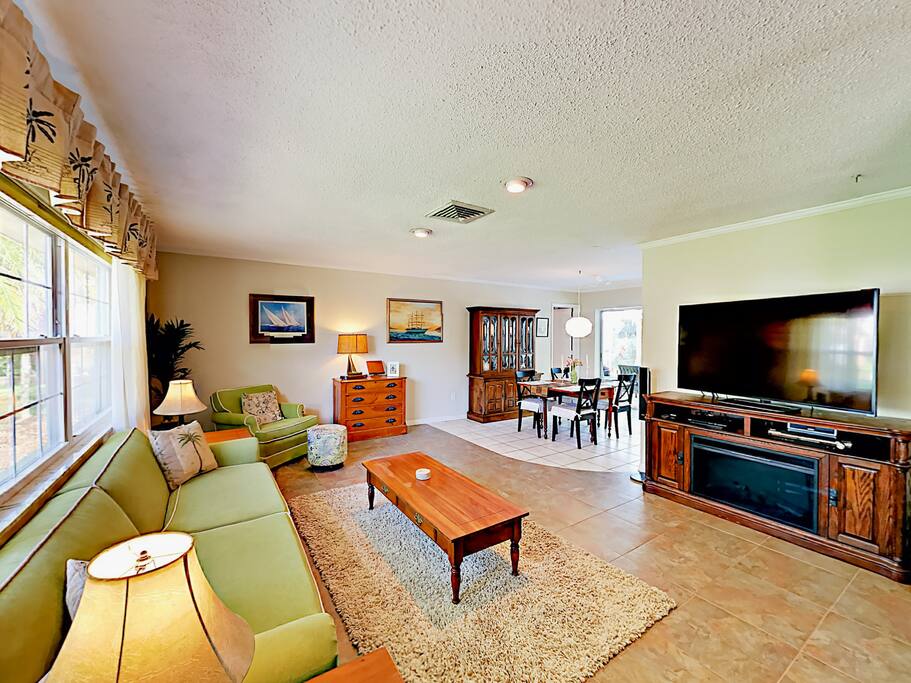 A large 60” Vizio TV in the living room.