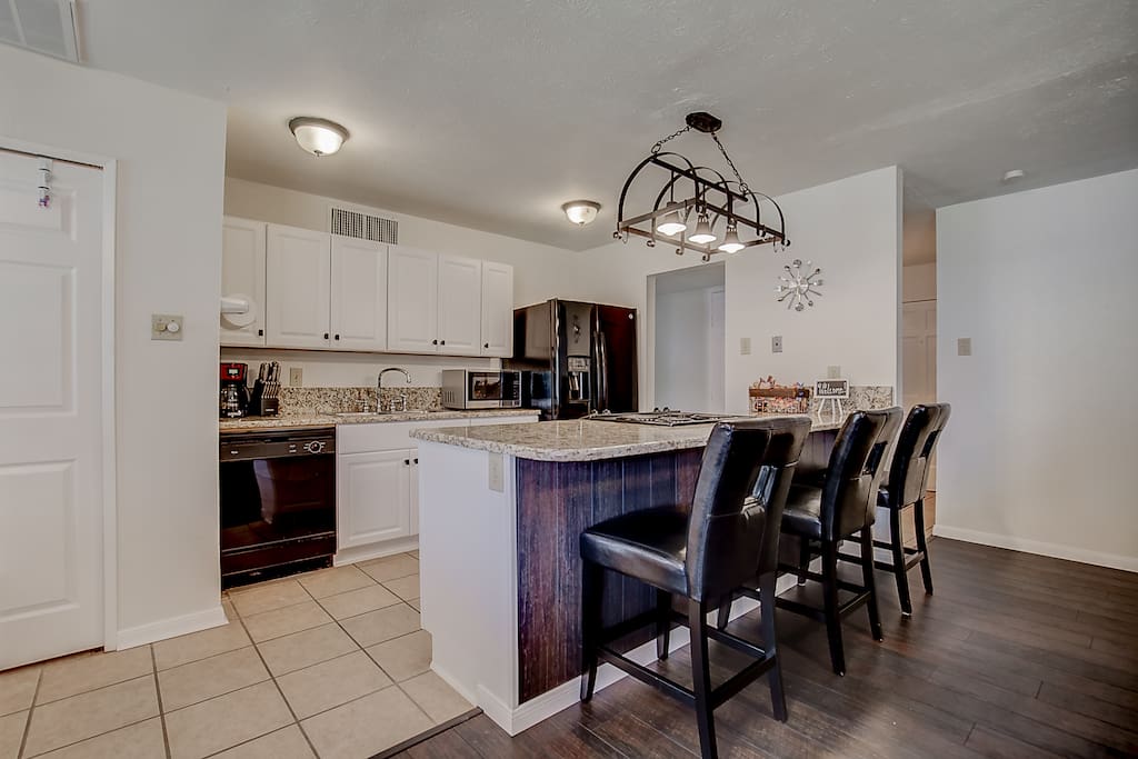 Remodeled kitchen with bar seating.