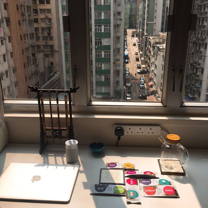 Long table provided in the bedroom. You can enjoy the typical Hong Kong island's street view from your bed.