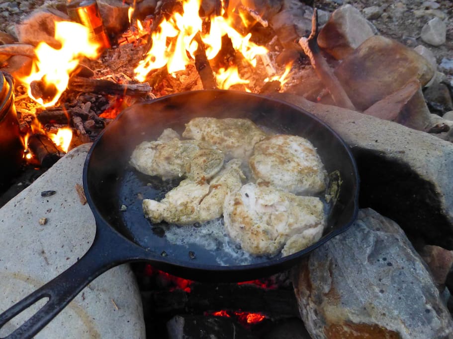 Prepare dinner over the campfire or on the propane camp stove.