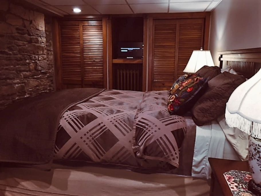 The Master Bedroom has a queen size bed and 2 cedar lined closets and a flat screen smart TV/Netflix