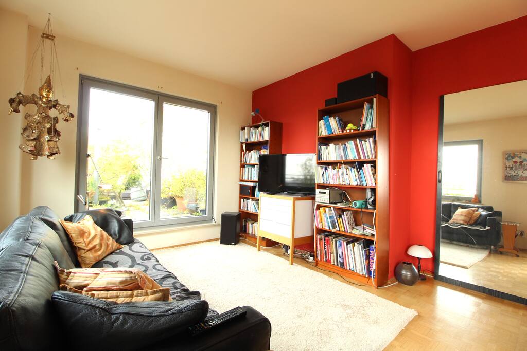 In the bright living room you can lay down and relax, read some book or watch TV.