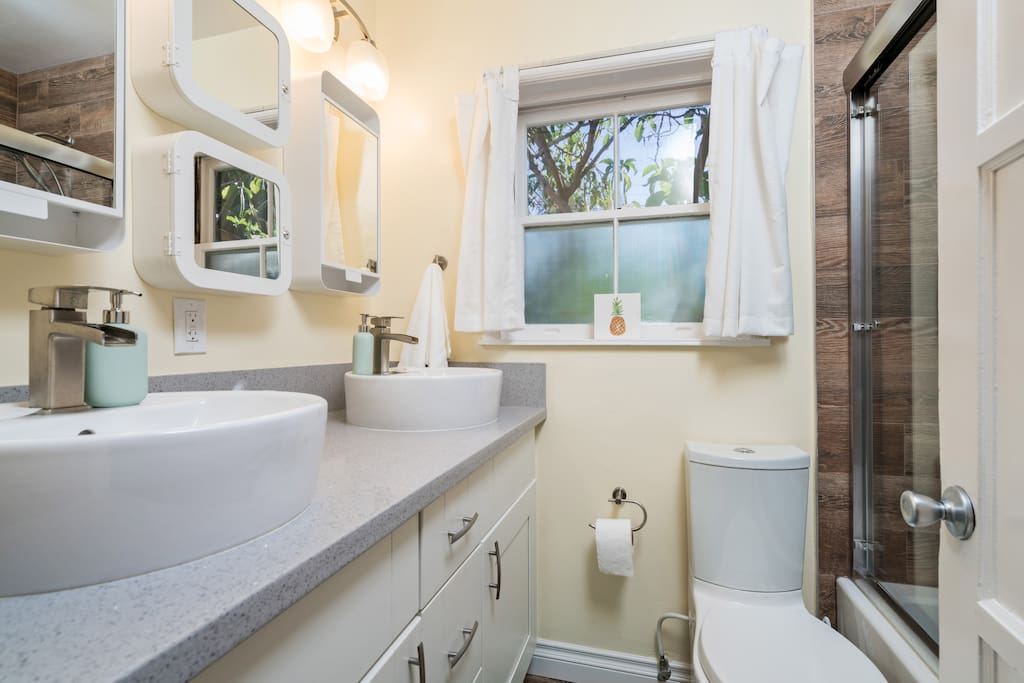 Main House Bathroom No. 2 with Double Sinks, Tub and Shower Combo