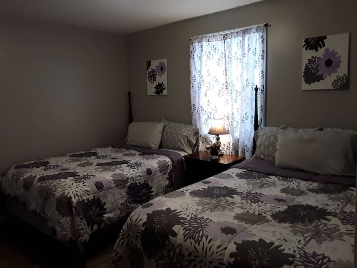 Bedroom #3 has 2 comfy full size beds. Clean linens and extra blankets. Clothes hanging rods with hangers.