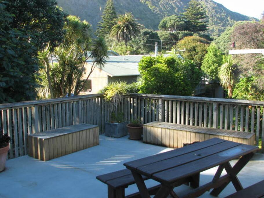 Sunny deck, view of the hills. overlooks the garden and fruit trees.