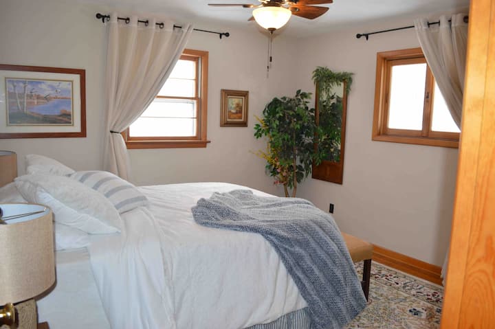 Cozy bedroom #2  with queen size bed, blackout drapes and full closet.  You’ll get the best night sleep in the luxury linens and quiet surroundings. 