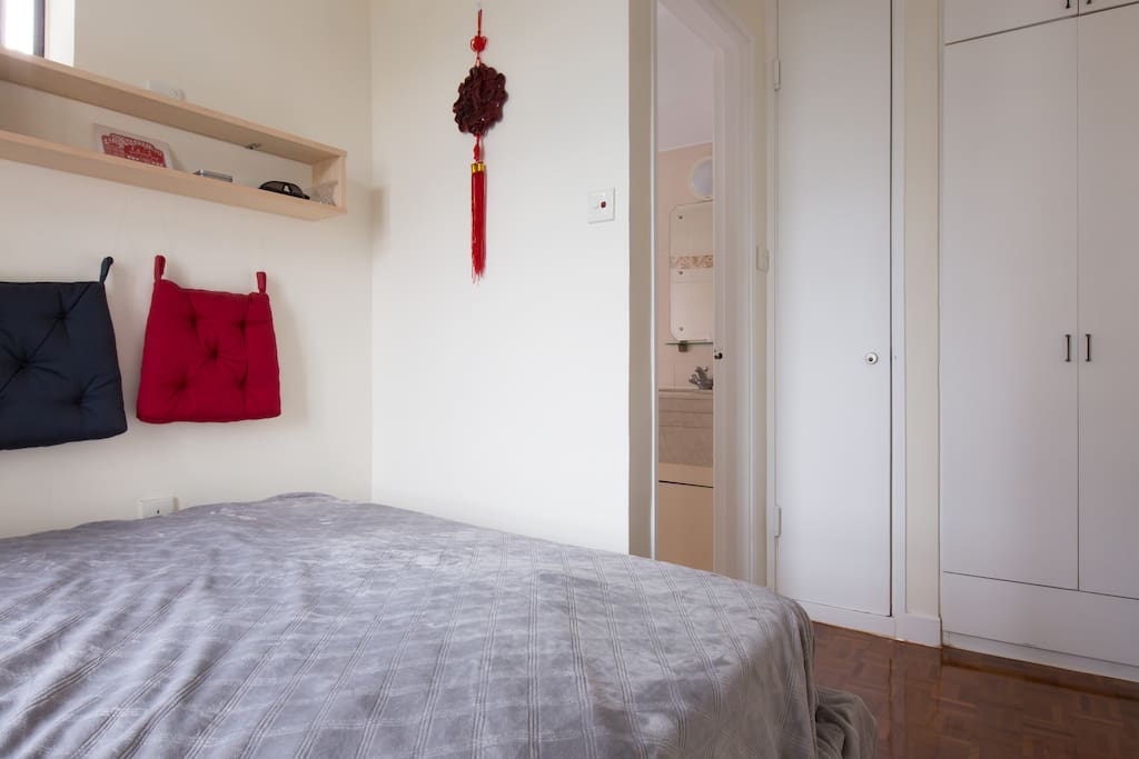 Bedroom with bathroom door