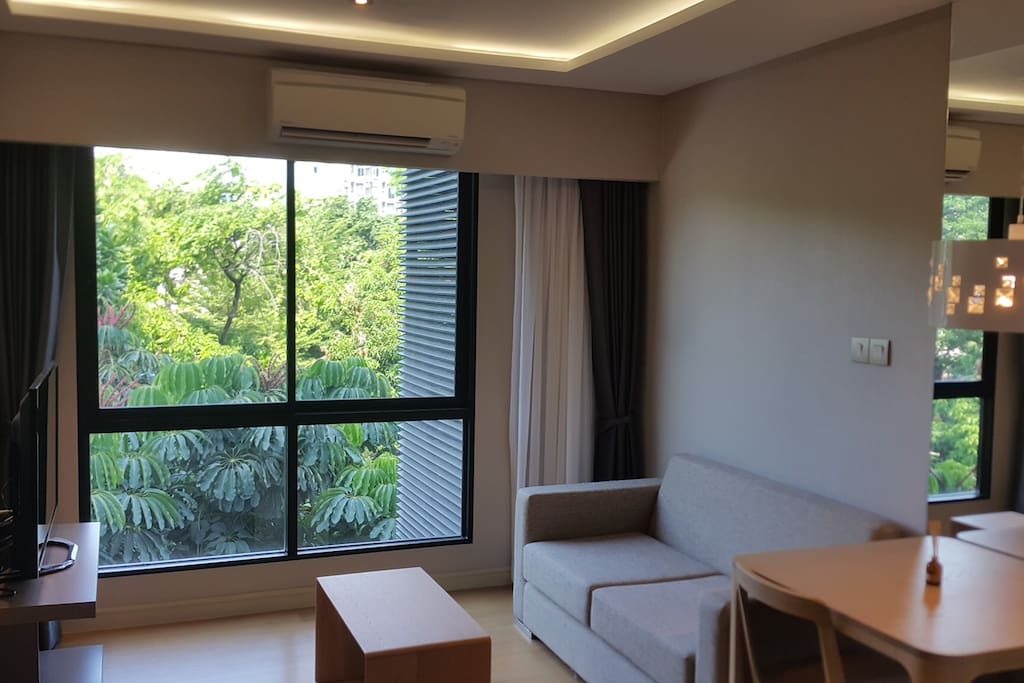Living room with sofa & coffee table & nice view