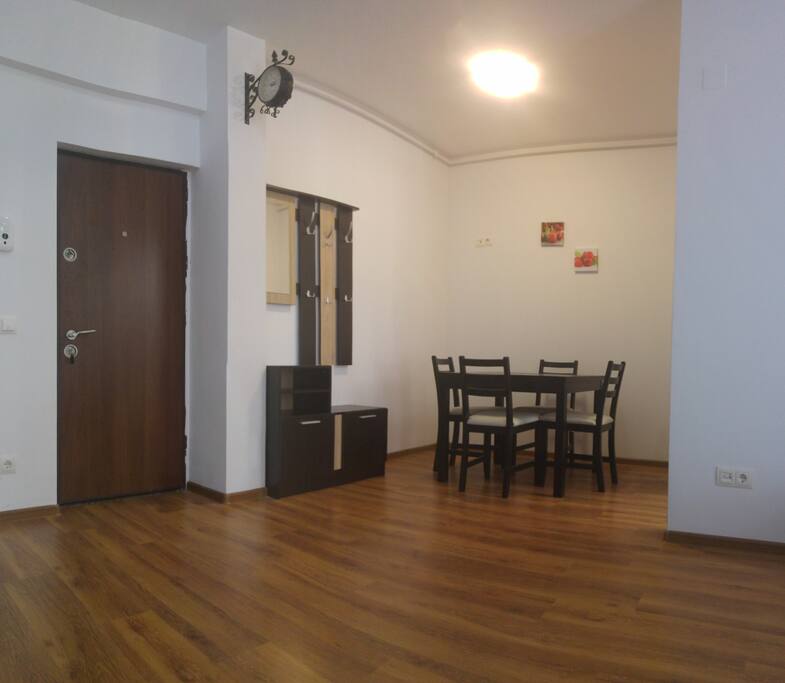 The entrance to the apartment and dining area