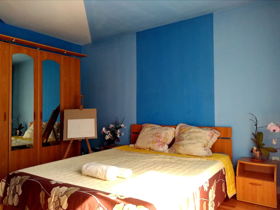 Comfy, big and well lit room, has a desk and private bathroom. There is also a balcony.