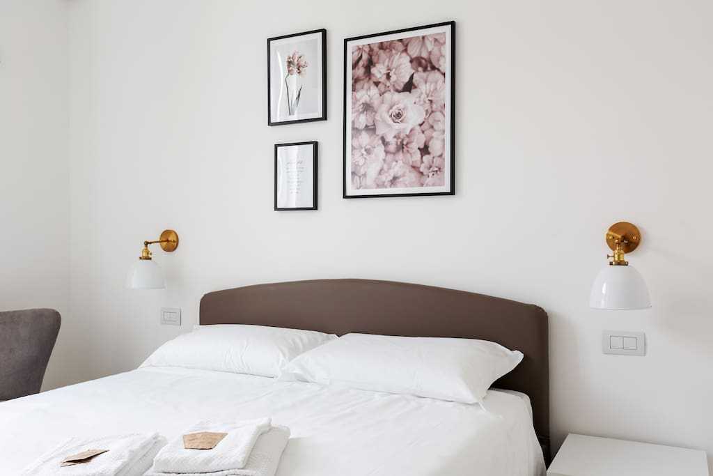 The Bedroom - The comfortable double bed with soft bed-linen and towels