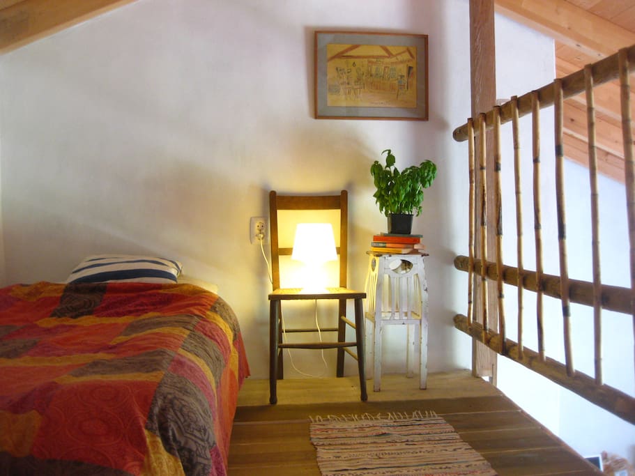 The mezzanine with 2 single beds (can be put together)