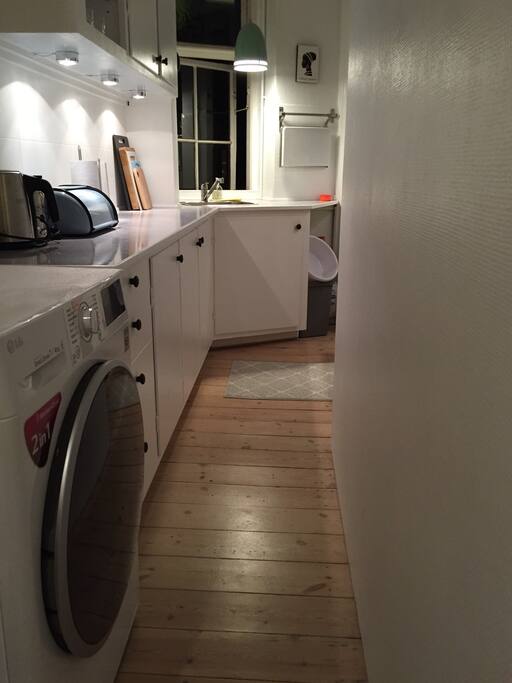 Kitchen including all necessary appliances and washing machine and dryer.