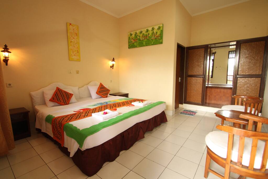 The room has an Old Bali feel to it. No TV here. Read a book and Relax.