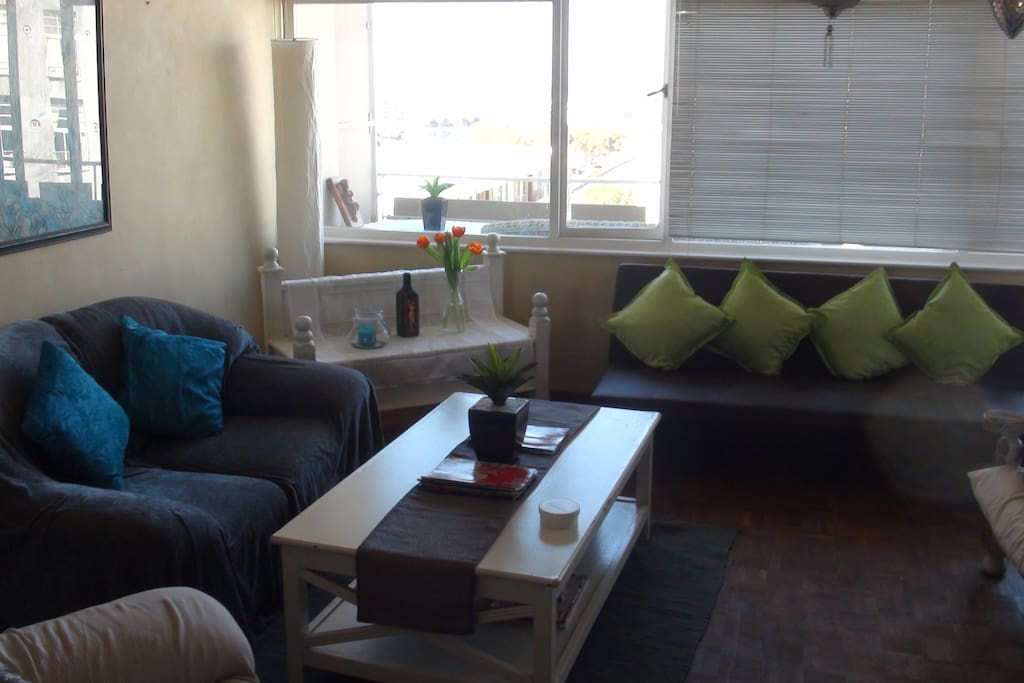 One angle of the lounge with the balcony in the background.