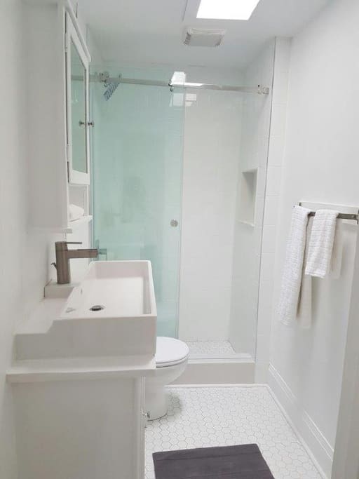 Gorgeous washroom with glass shower stall