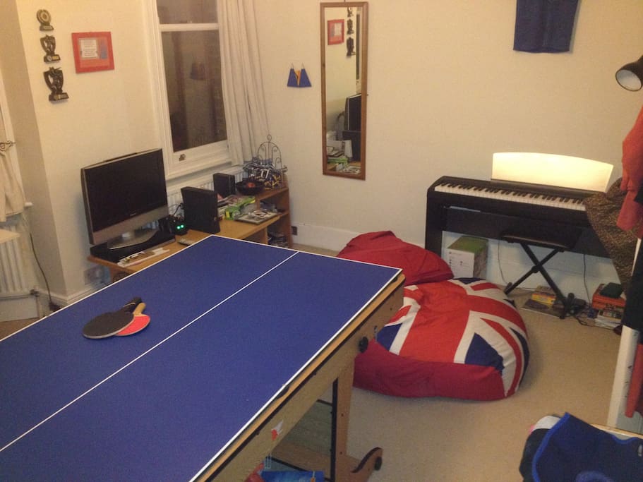 Games room.
xbox,table tennis/pool table/piano/darts