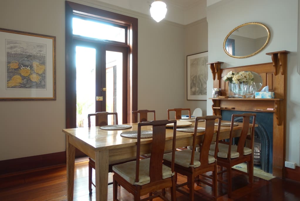 Spacious dining room connected to kitchen.