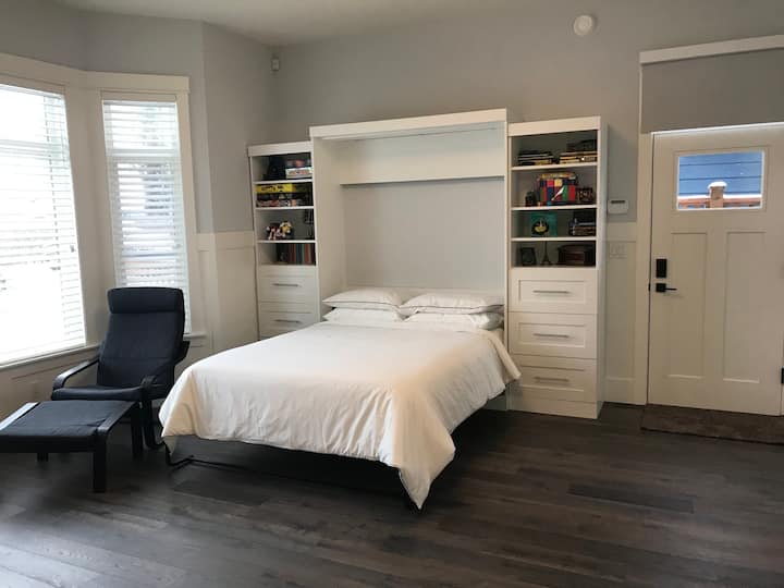 Murphy bed with queen memory foam mattress and drawers with extra bedding, towels and blankets as well as empty drawers for you.
