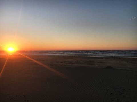 Ocean view, right in front of the sandy beach, away from traffic