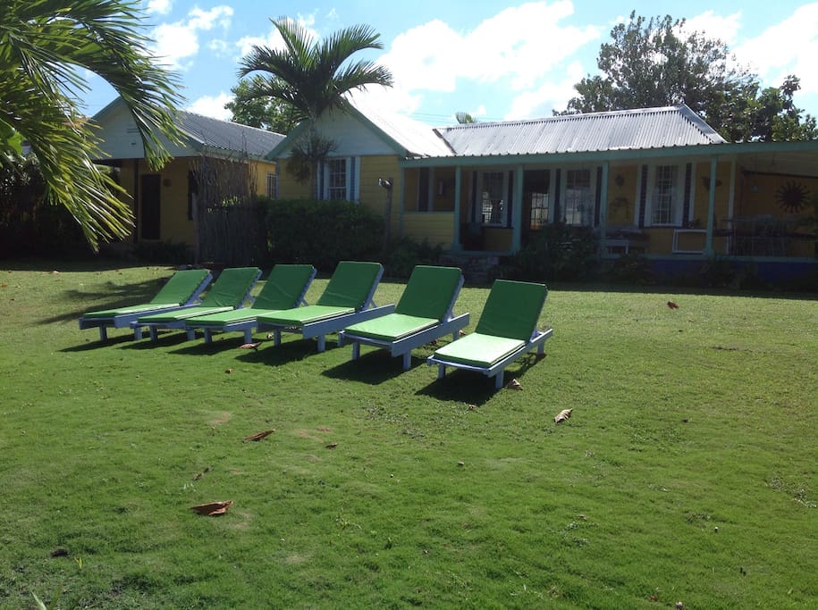 Front lawn with beach chairs to get that perfect sun tan.