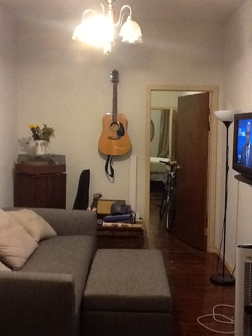 Living Room area with brand new Queen Sleeper Sofa and TV with connection to Cable TV/Netflix Access