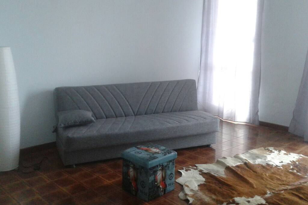 Soggiorno con due divani letto